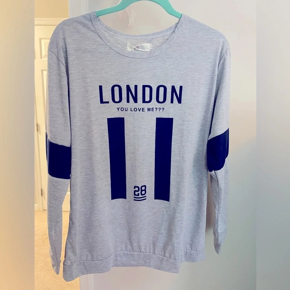 NWT “London You Love Me” XXL gray long sleeve jersey. Crew neck w/navy blue.